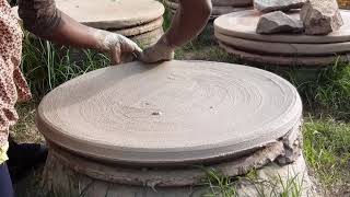 Injera mitad making near Addis Ababa Ethiopia Mogogo clay plate [upl. by Enilorac]