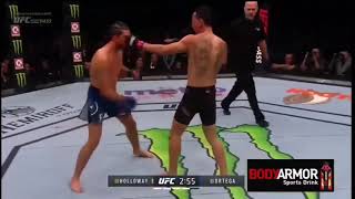 Max Holloway teaching Brian Ortega to block punches mid fight [upl. by Ahsiuq]